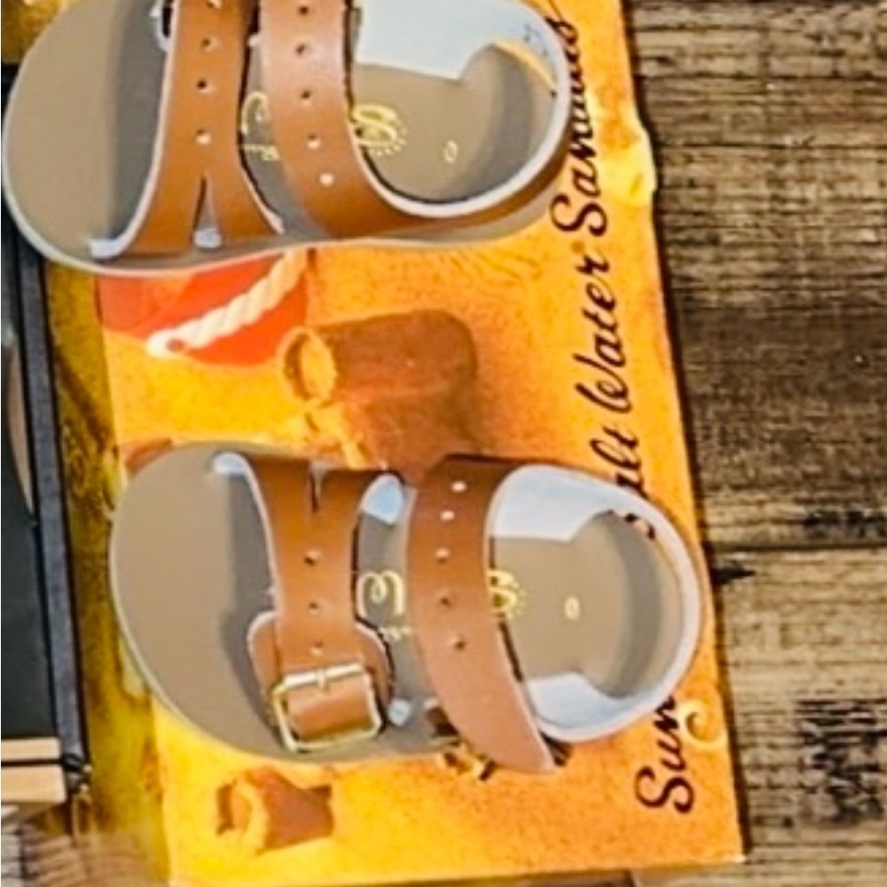 Sun-sans baby sandals. New never worn size 0
